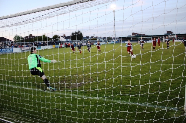 No chance for the Salthill keeper James Keane an Ramblers' Martin Deady slots home a penalty sending him the wrong way