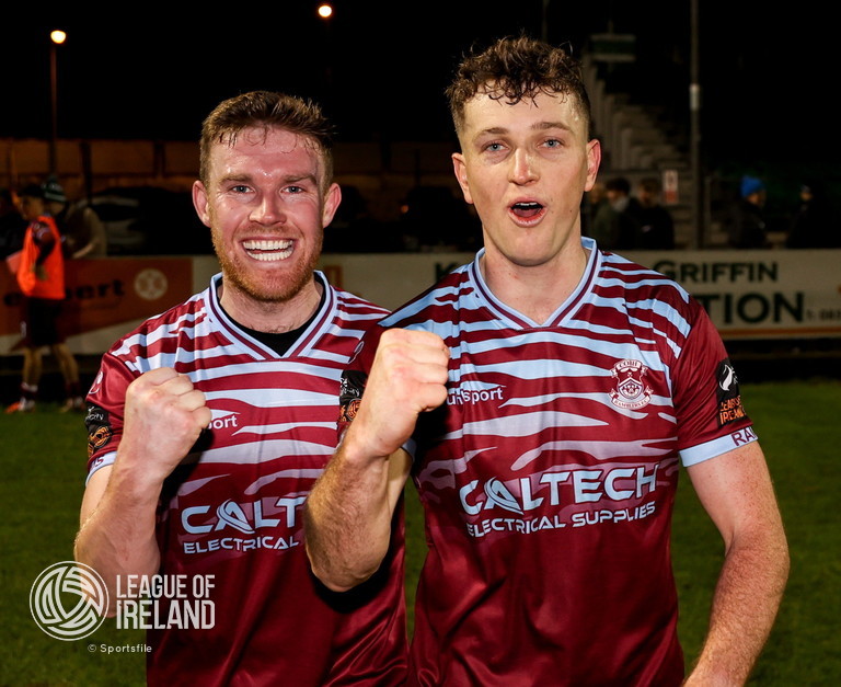 14 February 2025; Cobh Ramblers players, from left, Jason Abbot, and Cian Bargary celebrate after their side's victory in the SSE Airtricity Men's First Division match between Treaty United and Cobh Ramblers at Markets Field in Limerick. Photo by Michael P Ryan/Sportsfile
